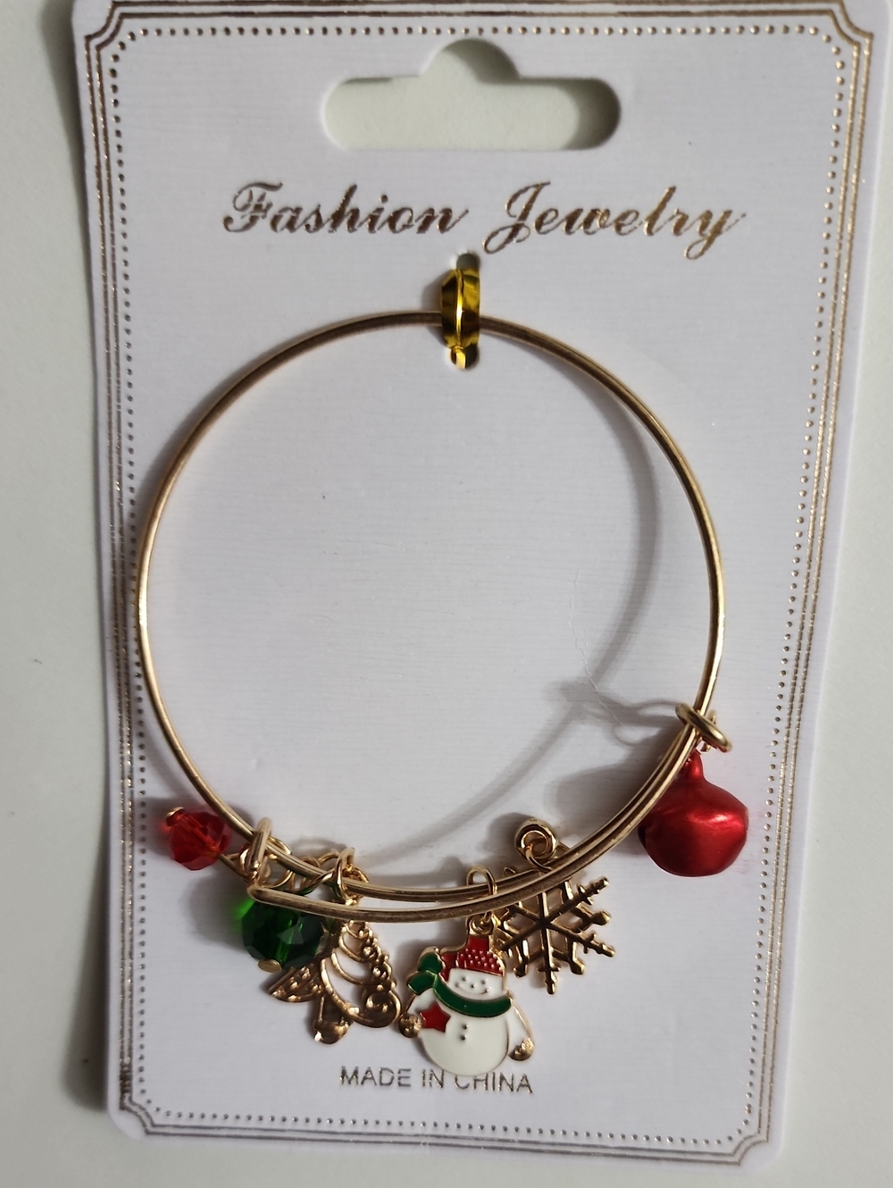 Fashion Jewelry Gold-Tone Holiday Charm Bangle with Red and Green Accents
